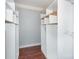 Walk-in closet features hardwood floors and storage space at 5141 Grays Ridge Dr, Charlotte, NC 28269