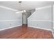 Dining room features wood floors, neutral walls, and recessed lighting at 5141 Grays Ridge Dr, Charlotte, NC 28269