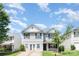 Attractive two-story home with a manicured lawn, offering a blend of comfort and style at 5141 Grays Ridge Dr, Charlotte, NC 28269