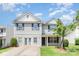 Charming two-story home with light siding, black shutters, and a well-manicured front lawn at 5141 Grays Ridge Dr, Charlotte, NC 28269