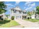 Inviting two-story home with a well-manicured lawn and a concrete driveway at 5141 Grays Ridge Dr, Charlotte, NC 28269