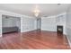 Large living room features hardwood floors, fireplace, and an open floor plan at 5141 Grays Ridge Dr, Charlotte, NC 28269