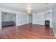 Large living room features hardwood floors, fireplace, and an open floor plan at 5141 Grays Ridge Dr, Charlotte, NC 28269