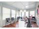 Sunroom with ample windows, wood floors, modern lighting fixtures at 5141 Grays Ridge Dr, Charlotte, NC 28269