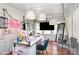 Sunroom with ample windows, wood floors, modern lighting fixtures at 5141 Grays Ridge Dr, Charlotte, NC 28269