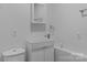 Modern bathroom featuring a floating vanity, contemporary faucet, and sleek decor at 5229 Mt Holly Huntersville Rd, Charlotte, NC 28216