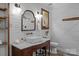 Bathroom featuring white shiplap walls, a vintage vanity, and modern fixtures at 5229 Mt Holly Huntersville Rd, Charlotte, NC 28216