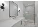 Modern bathroom with a double vanity, sleek fixtures, and a glass-enclosed shower at 536 Hillside Ave, Charlotte, NC 28209