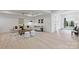 Bright living room with hardwood floors, neutral decor, and a view to the backyard at 536 Hillside Ave, Charlotte, NC 28209