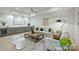 Spacious living room with modern decor, comfortable seating, and a wet bar for entertaining at 536 Hillside Ave, Charlotte, NC 28209