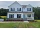 Charming two-story home with a welcoming front porch and classic architectural details at 5630 Galloway Dr # 49, Stanfield, NC 28163