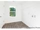 Laundry room featuring a window with a view, hard flooring and washer/dryer hookups at 5630 Galloway Dr # 49, Stanfield, NC 28163