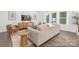 Cozy living room with hardwood floors, neutral tones, and comfortable furnishings at 5630 Galloway Dr # 49, Stanfield, NC 28163