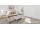 Bright main bedroom with carpet, upholstered headboard and adjacent bathroom for added convenience at 5630 Galloway Dr # 49, Stanfield, NC 28163