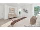 Bright main bedroom features plush carpeting, ample natural light, and modern decor at 5630 Galloway Dr # 49, Stanfield, NC 28163