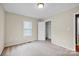 Comfortable bedroom with carpet and a closet, providing ample space for organization at 5678 Cedar Run Dr, Denver, NC 28037