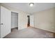 Neutral bedroom featuring a closet with wire shelving and doorway to the rest of the home at 5678 Cedar Run Dr, Denver, NC 28037