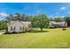 Front exterior of a house with a large yard and neighbor's house at 5678 Cedar Run Dr, Denver, NC 28037