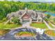 A grand clubhouse with beautiful architecture, landscaping, and a welcoming entrance at 640 Mackenzie Falls Dr, Fort Mill, SC 29715