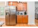 Kitchen boasts stainless steel refrigerator and granite countertops at 640 Mackenzie Falls Dr, Fort Mill, SC 29715