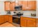 This updated kitchen features granite countertops and stainless steel appliances at 640 Mackenzie Falls Dr, Fort Mill, SC 29715
