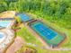 Aerial view of community tennis courts with manicured landscaping and fencing at 640 Mackenzie Falls Dr, Fort Mill, SC 29715