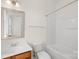 Well-lit bathroom with a modern vanity, framed mirror, and a shower-tub combination at 6429 Terrace View Ct, Charlotte, NC 28269