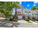 Charming townhome featuring brick accents, a one-car garage, and inviting front steps at 6429 Terrace View Ct, Charlotte, NC 28269