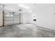 Clean, spacious two car garage with an automatic door and lots of room for storage at 6429 Terrace View Ct, Charlotte, NC 28269