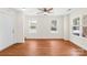 Inviting living room with hardwood floors and ample natural light from large windows at 6429 Terrace View Ct, Charlotte, NC 28269
