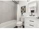 Clean bathroom featuring a white vanity, unique fixtures, and a shower/tub combo at 6824 Cortez Trl, Charlotte, NC 28227