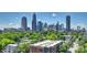 This aerial view showcases the building's prime location with stunning city skyline views at 715 N Graham St # 603, Charlotte, NC 28202