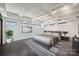 Spacious bedroom is filled with natural light with great ceiling detail and an accent rug at 715 N Graham St # 603, Charlotte, NC 28202