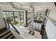 Lofted living room featuring a modern kitchen, hardwood floors, fireplace, and city views at 715 N Graham St # 603, Charlotte, NC 28202