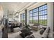 Bright living room showcasing an open floor plan, large windows, and modern finishes at 715 N Graham St # 603, Charlotte, NC 28202