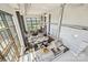 Open concept living space with modern kitchen, dining area, and living room with fireplace at 715 N Graham St # 603, Charlotte, NC 28202
