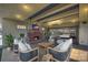 Enjoy the spacious rooftop patio with a fireplace and comfortable seating, leading into the bedroom at 715 N Graham St # 603, Charlotte, NC 28202