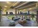 Relaxing rooftop patio featuring comfortable seating and stunning skyline views at 715 N Graham St # 603, Charlotte, NC 28202