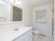 Bright bathroom with a large mirror and a white vanity at 723 Rabun Ln, Rock Hill, SC 29730