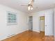 Bedroom with hardwood floors, closet, ceiling fan, and natural light at 723 Rabun Ln, Rock Hill, SC 29730