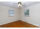 Bedroom featuring hardwood floors, and ample natural light from two windows at 723 Rabun Ln, Rock Hill, SC 29730