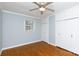Bedroom featuring a ceiling fan, a window and multiple closets at 723 Rabun Ln, Rock Hill, SC 29730