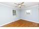 Bedroom with two windows and hardwood floors at 723 Rabun Ln, Rock Hill, SC 29730