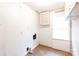 Laundry room featuring linoleum flooring, white walls, and a window at 723 Rabun Ln, Rock Hill, SC 29730
