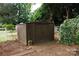 Exterior shot of an outbuilding with brick pavers and some surrounding greenery at 723 Rabun Ln, Rock Hill, SC 29730