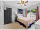 Neutral bedroom with a double bed, large window, and closet at 7321 Mapleridge Dr, Charlotte, NC 28210