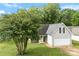 Charming single-Gathering home with a well-maintained lawn and two-car garage at 7321 Mapleridge Dr, Charlotte, NC 28210