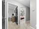 Hallway offering access to the bedroom and office space for convenient living at 7321 Mapleridge Dr, Charlotte, NC 28210