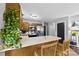 Functional kitchen with stainless steel appliances and counter seating at 7321 Mapleridge Dr, Charlotte, NC 28210