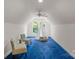 Bright bonus room with vaulted ceiling, blue carpet, and tent for  at 7501 Cleyera Cir, Waxhaw, NC 28173